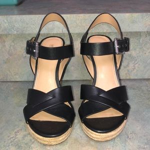 Comfortable black Micheal Kors wedges. Worn once.